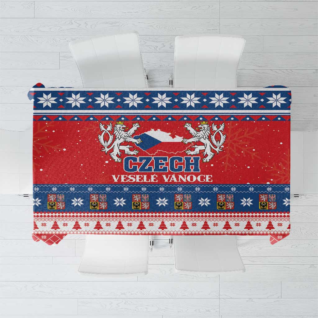 Red Christmas tablecloth with blue and white snowflake border and Czech crest graphic