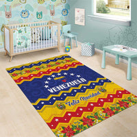 Colorful Christmas floor rug with blue, red, yellow stripes and “Venezuela Feliz Navidad”