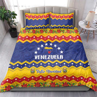 Venezuela Christmas bedding set on bed: blue star panel with “VENEZUELA” text and “Feliz Navidad”