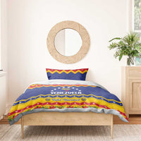 Venezuela Christmas bedding set on bed with blue star stripes, “VENEZUELA,” and “Feliz Navidad”