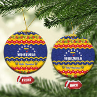 Round ceramic Venezuela Christmas ornament, blue and red Feliz Navidad with gold hanging string