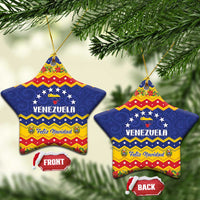 Star-shaped ceramic Venezuela Feliz Navidad ornament with gold hanging string