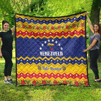 Venezuela Christmas quilt with blue star panel, bold zigzag bands, and Feliz Navidad