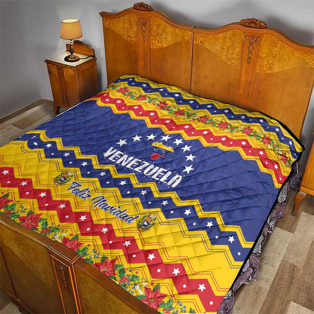 Venezuela Christmas quilt on bed, blue star center with VENEZUELA and Feliz Navidad