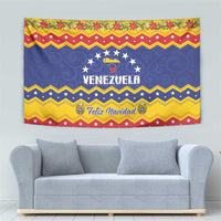 Christmas tapestry showing "VENEZUELA" text, star wreath, "Feliz Navidad" zigzags