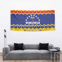Christmas tapestry with "VENEZUELA" banner, "Feliz Navidad" ribbon, colorful striped bands