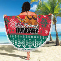 Round Christmas beach blanket with fringe, red and green holiday print featuring Santa and deer