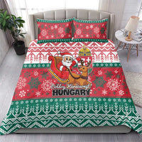 Red and green Christmas duvet cover with Santa and reindeer, styled with two pillowcases