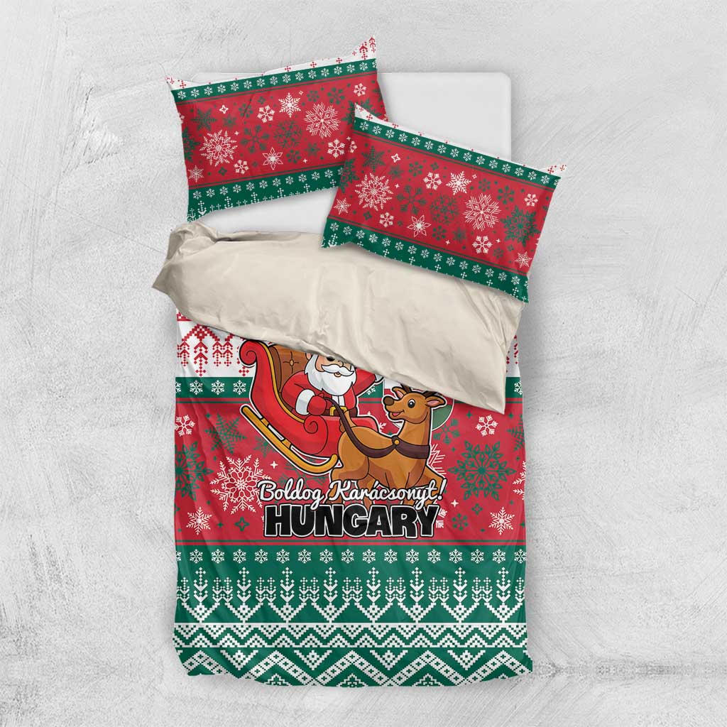 Red and green Christmas bedding set laid flat: duvet cover and two pillowcases with Santa