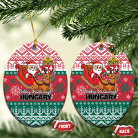Red and green oval Hungary ceramic Christmas ornaments with Santa and reindeer design.