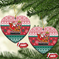 Red and green heart-shaped Hungary ceramic Christmas ornaments with Santa and reindeer design.