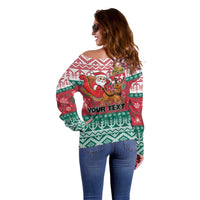 Women’s off-shoulder Christmas sweater, back view with Santa graphic and "YOUR TEXT"