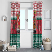 Pair of red Christmas window curtains with Santa, reindeer, and festive patterns