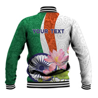 Back view varsity baseball jacket with green, white, and orange lotus paisley print, ribbed hem