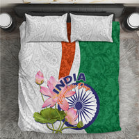 Bedding set: white paisley pillowcases, green and orange floral duvet with India graphic