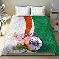 Bedding set: white paisley pillowcases, green and orange floral duvet cover with India emblem