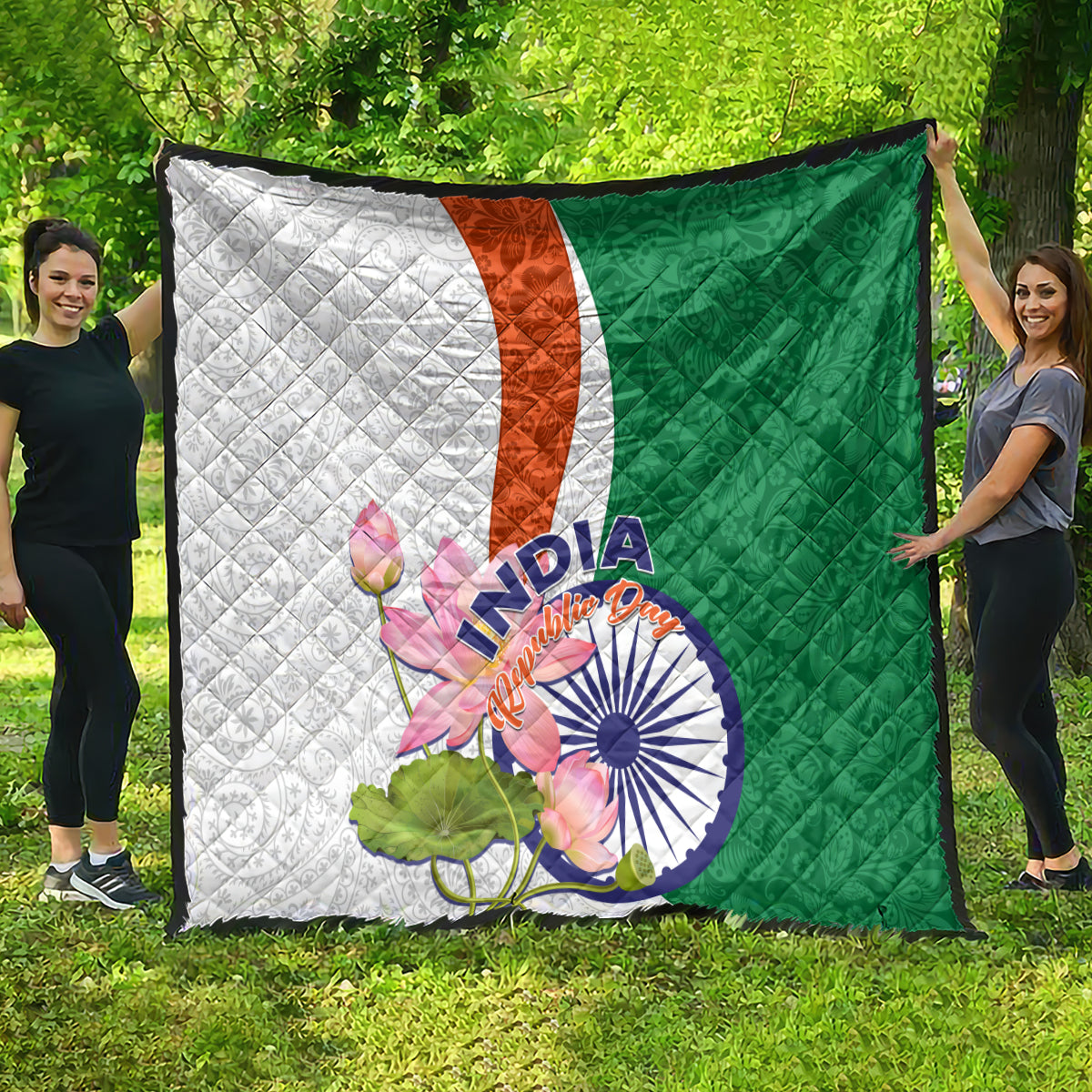 Quilt showing green and white halves with an orange stripe and large India lotus graphic