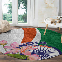 Round carpet corner view with tricolor paisley panels, lotus flowers, and India text