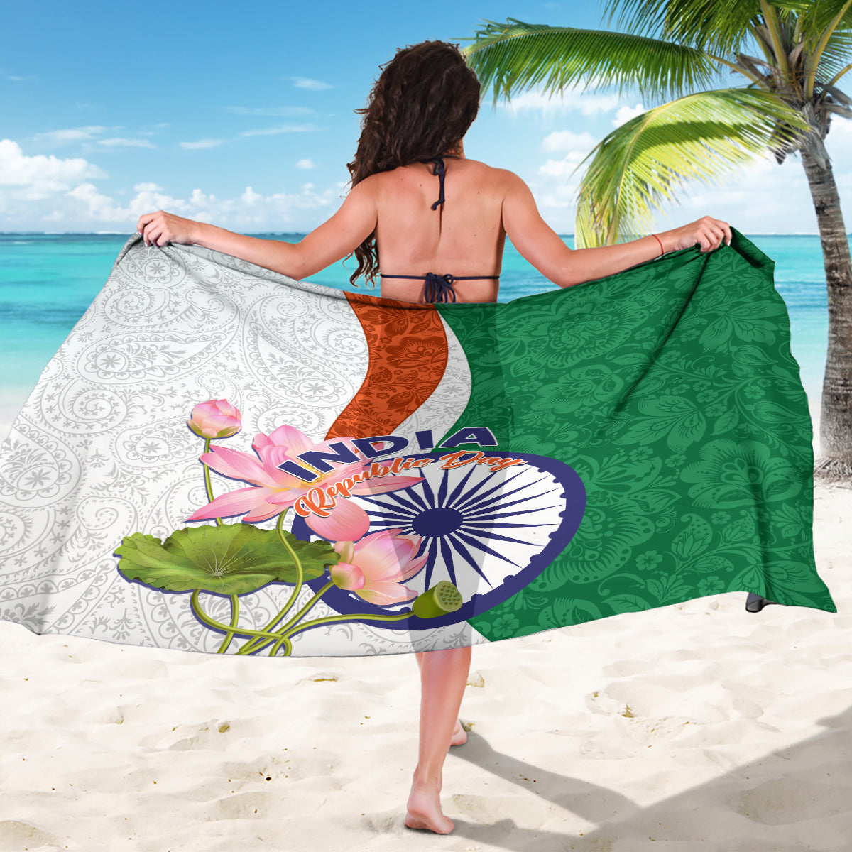 Green and white sarong worn with both sides visible, featuring India emblem