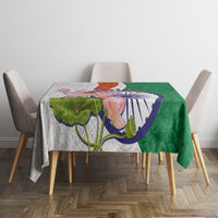 Green lotus floral paisley tablecloth on dining table with colorful flower India graphic