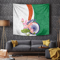 Wall tapestry with white, orange, and green paisley pattern and lotus floral design with an India emblem