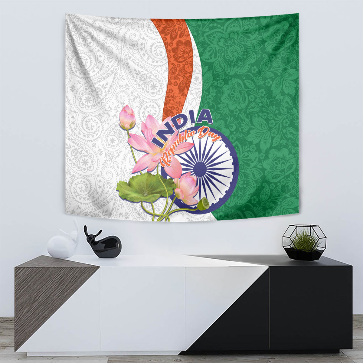 Wall tapestry showing white paisley, orange stripe, and green paisley with lotus floral and India emblem