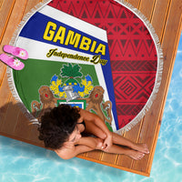 Round beach blanket, Gambia Independence Day crest in blue-yellow-green with red pattern