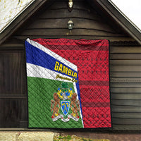 Gambia flag quilt hanging in doorway with quilted texture and coat of arms