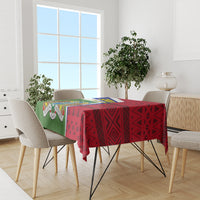Gambia Independence Day tablecloth on dining table with green left panel and red geometric pattern