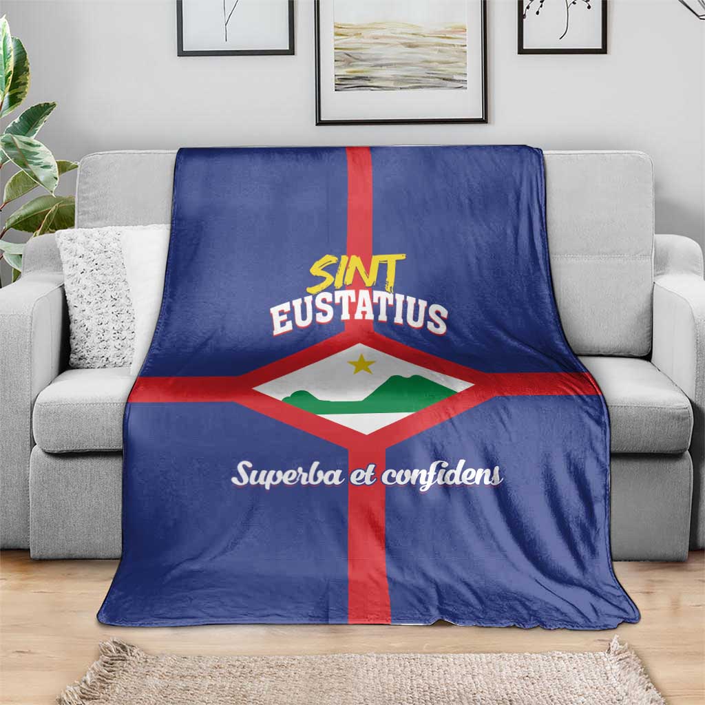 Blue Sint Eustatius flag blanket with red cross and 'Superba et confidens' text.
