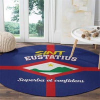 Round blue rug with flag-style emblem, red cross, and 'Superba et confidens' lettering