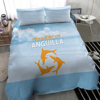 Light blue bedding set with orange bird emblem on duvet front and two pillowcases