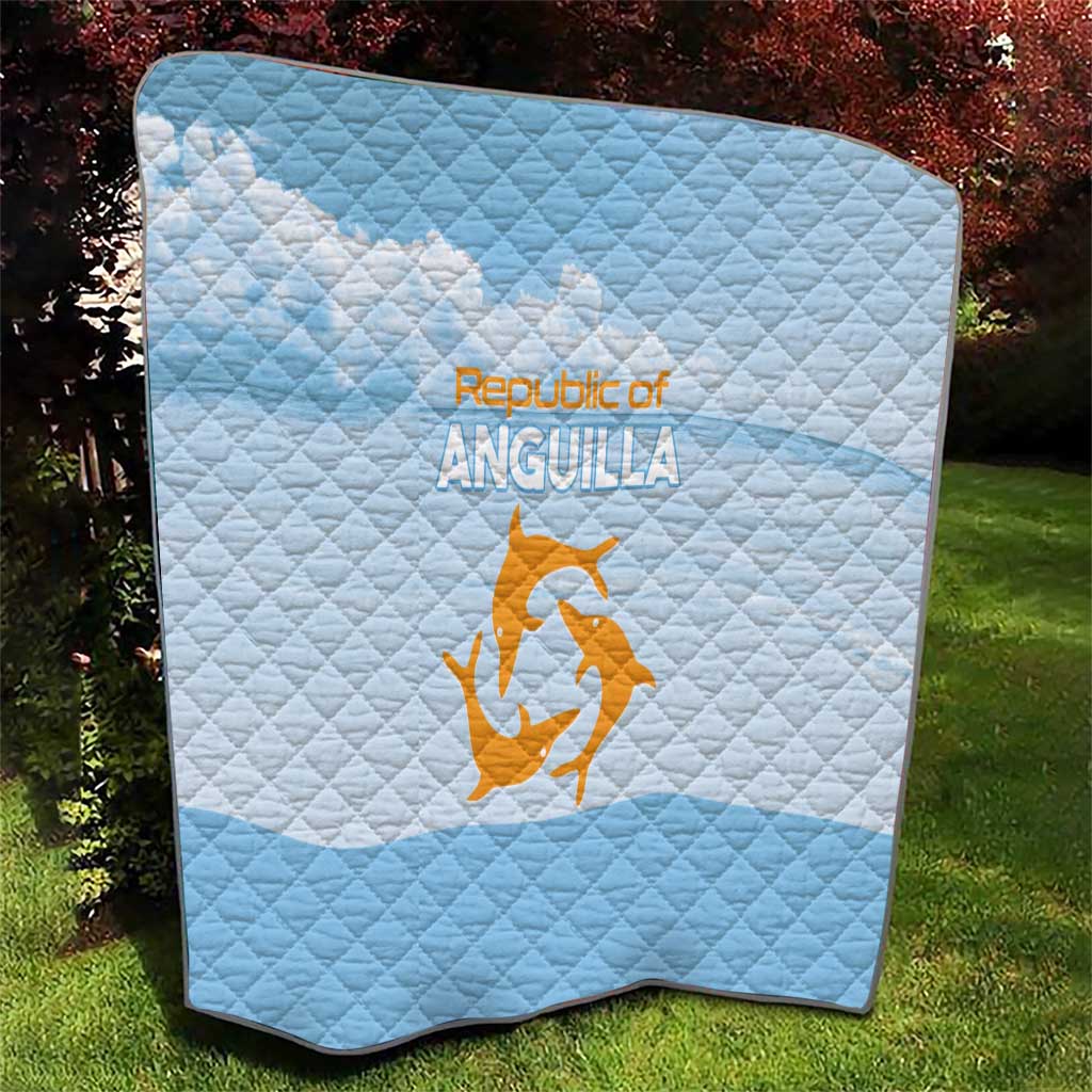 Light blue diamond-stitched quilt with Republic of Anguilla logo and orange emblem
