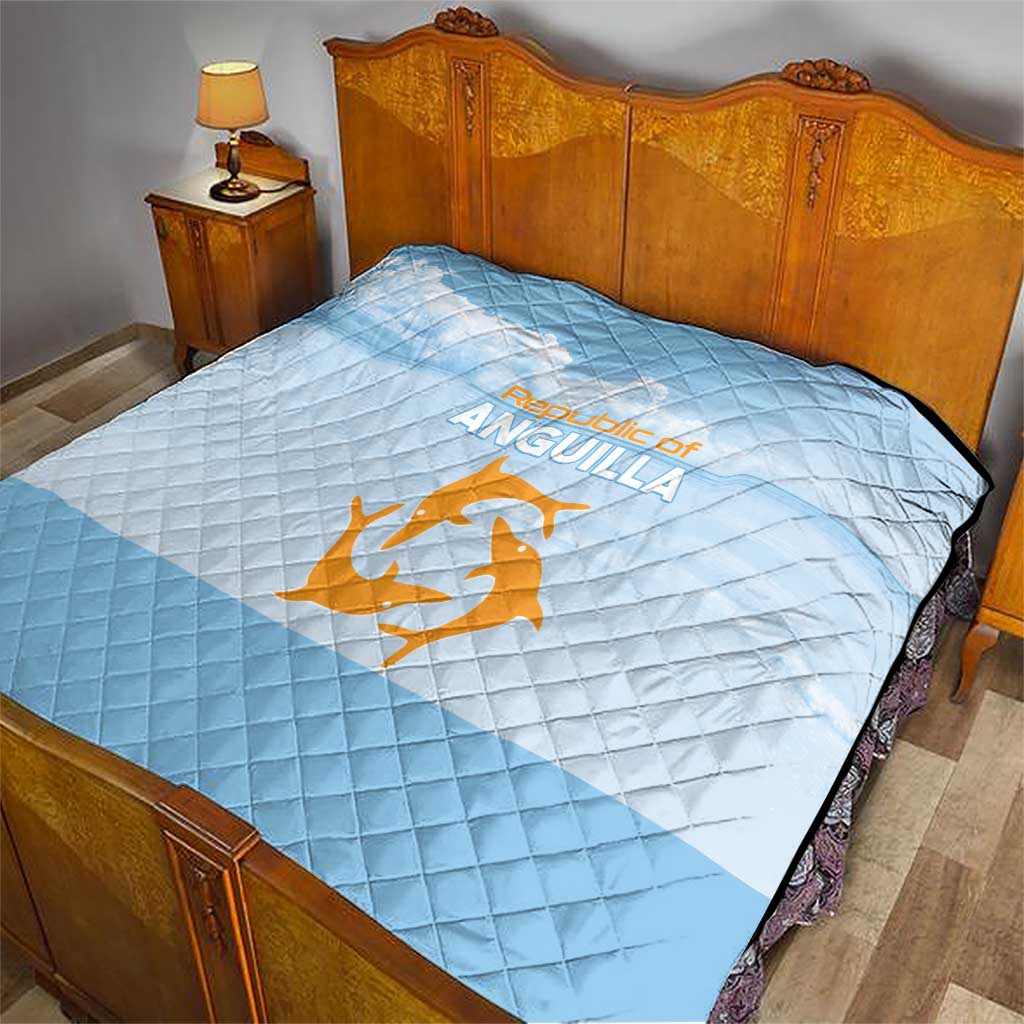 Light blue quilt with diamond pattern and Republic of Anguilla logo in orange