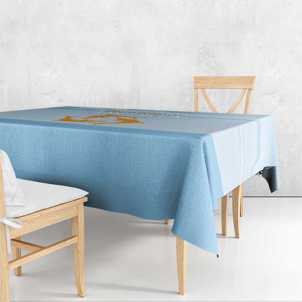 Blue tablecloth with Republic of Anguilla graphic on corner edge, chair seating