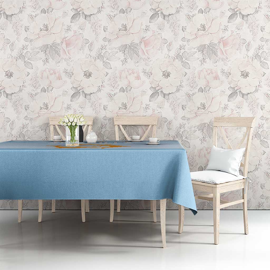 Blue tablecloth with Republic of Anguilla print on dining table in floral room