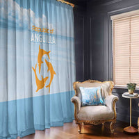 Blue window curtain with gold animal and cloud print, one panel beside an armchair.