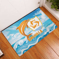 Blue dolphin rubber doormat on wood floor, rectangular with orange sea scene logo