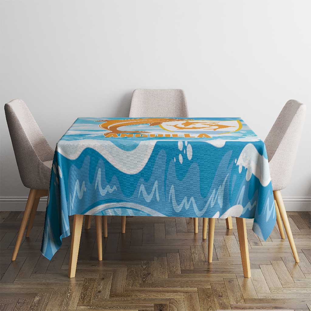 Blue dolphin tablecloth with orange and gold graphic, shown on a dining table with chairs.