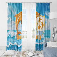 Blue dolphin window curtain set with orange-gold dolphin crest over ocean wave stripes.