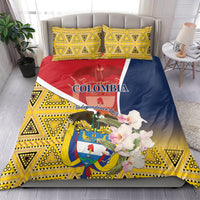 Colombia bedding set with yellow geometric pattern, red-blue flag panel, and white flowers