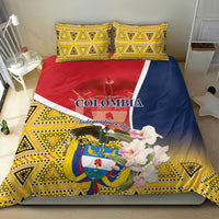 Colombia bedding set with yellow triangle patterns, country crest, and white flower bouquet