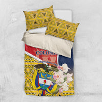 Colombia bedding set with white pillowcases, yellow geometric print, and red-blue flag panel