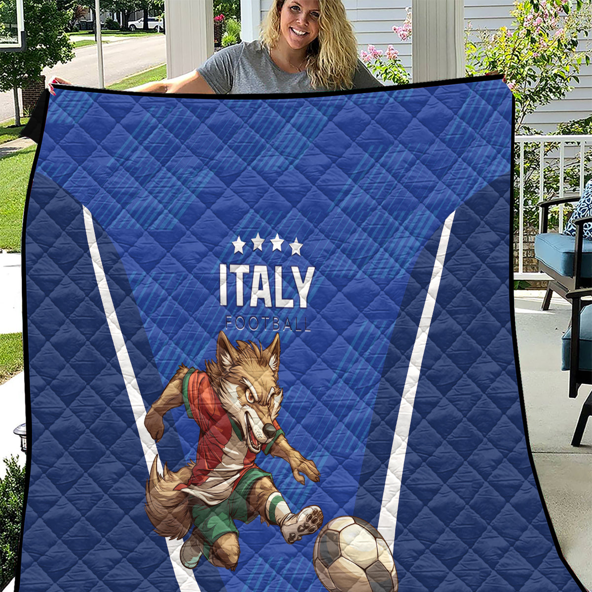 Blue quilt with 'ITALY' and horse kicking a soccer ball, white diagonal stripes