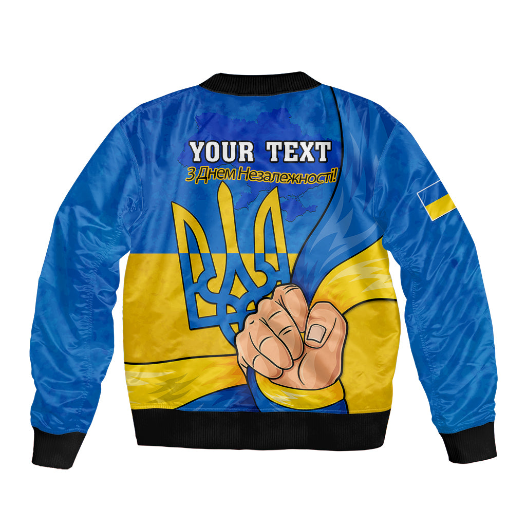 Blue bomber jacket back print: 'YOUR TEXT' over trident and hand graphic, black ribbed hem