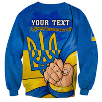 Blue unisex sweatshirt with 'YOUR TEXT' back print, trident and fist graphic