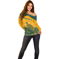 Yellow off-shoulder sweater with teal Aboriginal pattern and Australia graphic