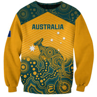 Yellow crewneck sweatshirt with green Aboriginal-style kangaroo graphic and AUS lettering
