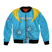 Light blue rugby bomber jacket with yellow shoulders, front zipper, black rib trim, Uruguay patch
