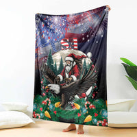 Christmas blanket draped on floor with Santa, eagle, and USA fireworks stars